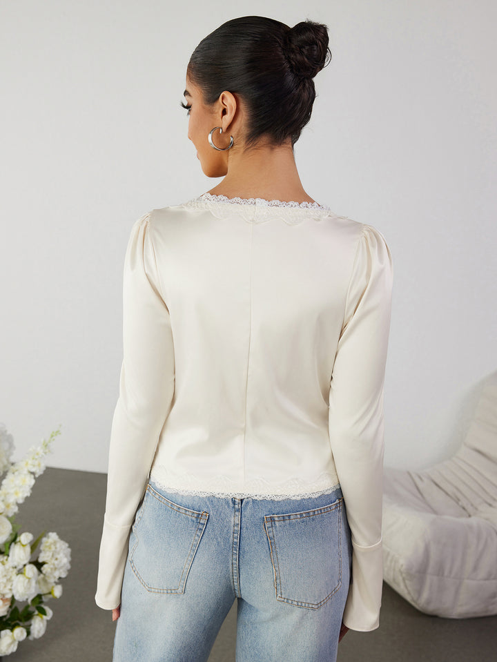 INAJAN Lace-Up Long-Sleeved Top